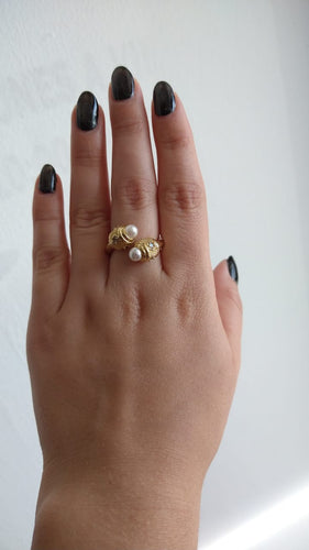Anillo ajustable con perla y zirconia a los extremos