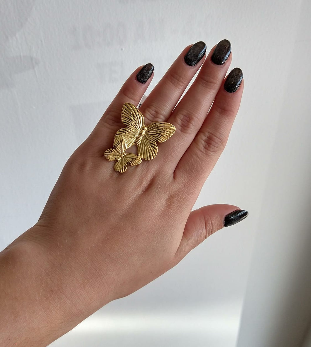 Anillo de doble mariposa